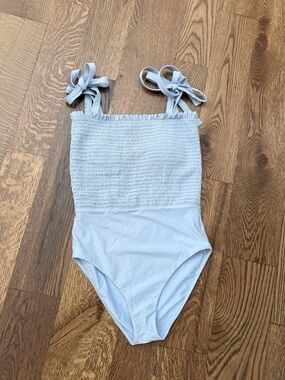 Minnow Women’s Light Blue Smocked One-Piece Swimsuit with Tie Straps - size M